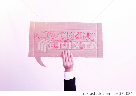 Hand writing sign Coworking Centreshared workplace often office and independent activity. Word Written on shared workplace often office and independent activity Hand writing sign Coworking Centreshared workplace often office and independent activity. Word Written on shared workplace often office and independent activity 94373024