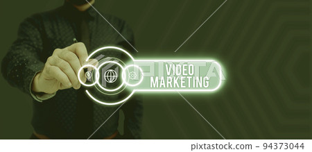 Hand writing sign Video Marketingcreate short videos about specific topics using articles. Business idea create short videos about specific topics using articles 94373044