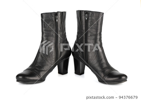 One pair of women's black autumn mid-heel ankle boots with zip fastening. One pair of women's black autumn mid-heel ankle boots with zip fastening. 94376679