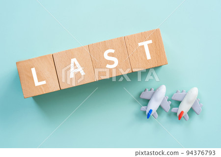 A block and an airplane written LAST 94376793