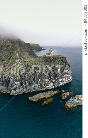 An old ruined lighthouse on Askold Island in the East Sea 94378002