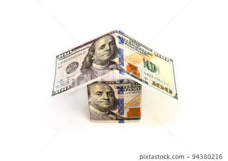 Dollar banknotes paper house on white background. Concept of Investment property 94380216