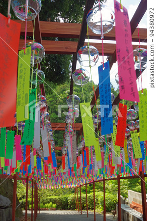 Wind chimes on the approach to Sannoji Temple of the Omuro school of Shingon Buddhism in Sasaguri Town, Fukuoka Prefecture 94380972