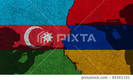 Armenia versus Azerbaijan, the flags of the two countries, separated by a crack, on a ruined wall. In the background the silhouette of two military men 94381191