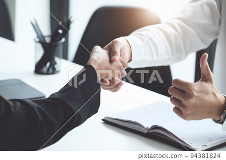 Young businessmen collaborate with partners to increase their business investment network for Plans to improve quality next month in their office. agreement concept. 94381824