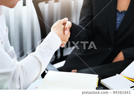 Young businessmen collaborate with partners to increase their business investment network for Plans to improve quality next month in their office. agreement concept 94381841