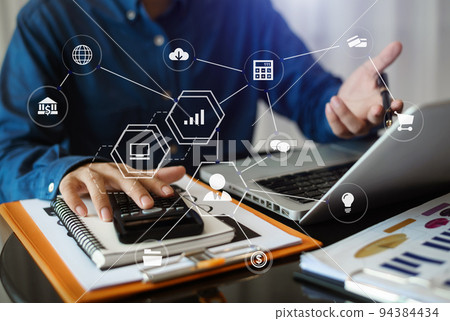 Businessmen are calculating income-expenditure and analyzing real estate investment data at office, Accounting Financial and tax systems concept. Businessmen are calculating income-expenditure and analyzing real estate investment data at office, Accounting Financial and tax systems concept. 94384434