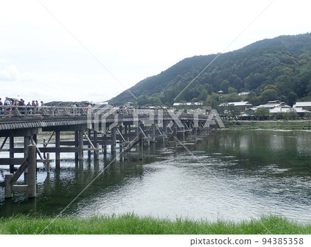 Togetsu Bridge over the Oi River between the left bank of the Katsura River and Nakanoshima Park in Kyoto City, Kyoto Prefecture. Togetsu Bridge over the Oi River between the left bank of the Katsura River and Nakanoshima Park in Kyoto City, Kyoto Prefecture. 94385358