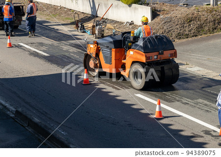 Road asphalt repair work Running road roller 94389075