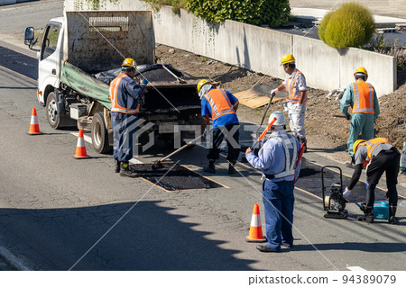 Asphalt repair work 94389079