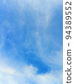 Stunning blue cloudy sky vertical background 94389552