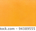 Yellow plaster texture background 94389555
