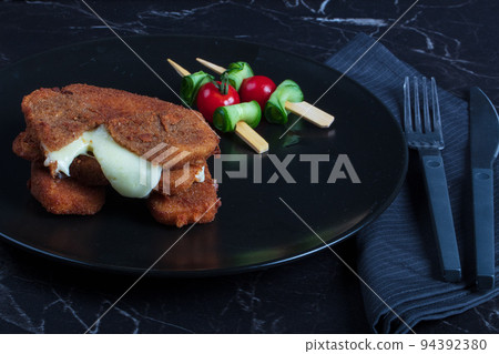 Cordon bleu speciality rolls with chicken breast, cheddar cheese. High quality photo Cordon bleu speciality rolls with chicken breast, cheddar cheese. High quality photo 94392380