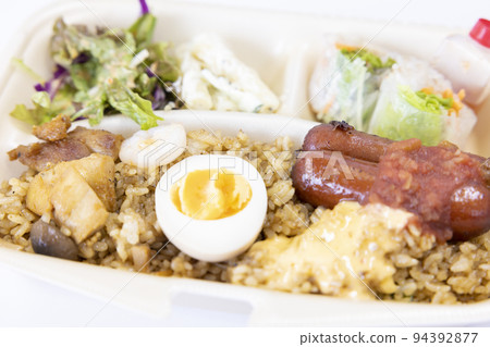 Delicious nasi goreng bento for takeout Delicious nasi goreng bento for takeout 94392877