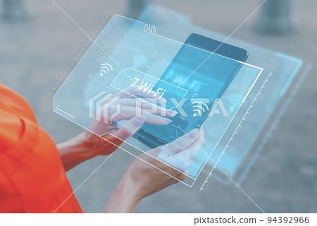 Wi-Fi standard 7. New wireless Internet technologies. Person holding a tablet 94392966