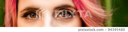 Macro shot of woman's eye with transparent makeup. Expressive look. sight. 94395480