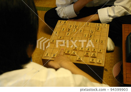 Two men playing shogi Two men playing shogi 94399903