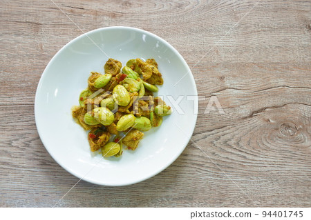 fried pork with flat bean in shrimp paste curry Thai southern food on plate fried pork with flat bean in shrimp paste curry Thai southern food on plate 94401745