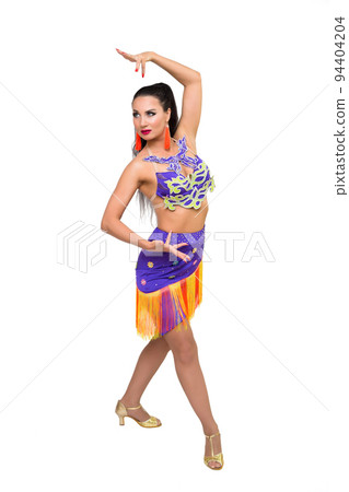A young female dancer in a bright costume shows hand movements on a white background A young female dancer in a bright costume shows hand movements on a white background 94404204