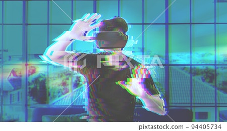 Young Asian man getting experience with VR virtual reality headset or 3D glasses isolated on white background. technology, gaming, entertainment concept 94405734