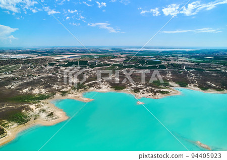 Drone point of view Embalse de La Pedrera lake Drone point of view Embalse de La Pedrera lake 94405923
