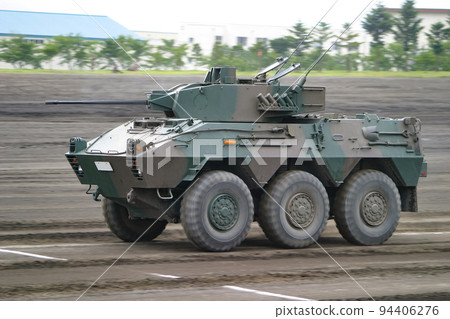 A reconnaissance armored car of the Ground Self-Defense Force running at full speed 94406276