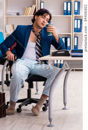 Employee coming to work straight from bed 94406801