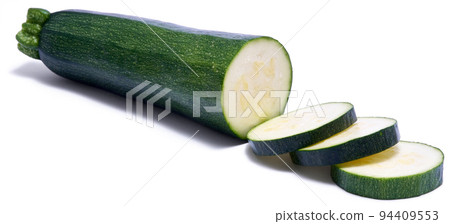 Sliced zucchini circles isolated on white background Sliced zucchini circles isolated on white background 94409553