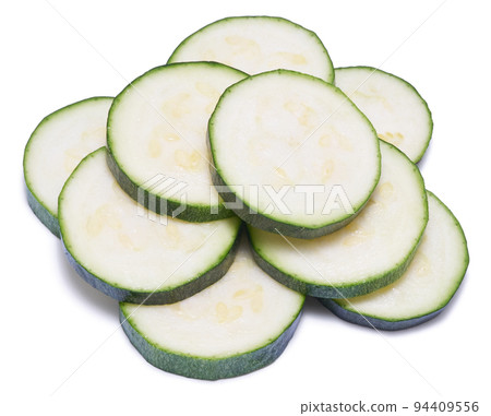 Sliced zucchini circles isolated on white background Sliced zucchini circles isolated on white background 94409556