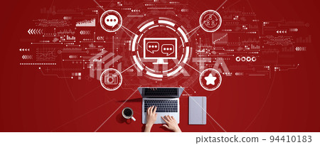 Social media theme with person working with laptop Social media theme with person working with laptop 94410183