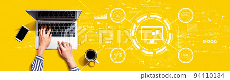 Stock trading theme with person using laptop Stock trading theme with person using laptop 94410184