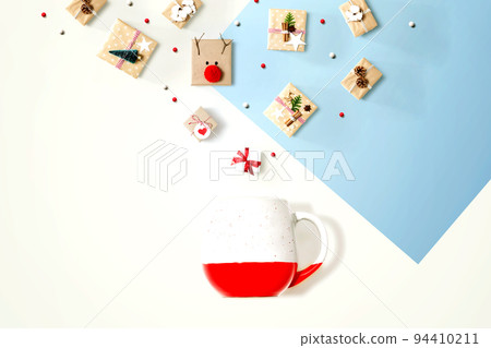 Christmas gift boxes with a red mug 94410211