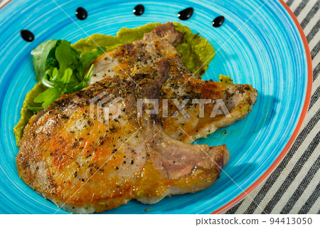 Grilled pork loin with guacamole Grilled pork loin with guacamole 94413050