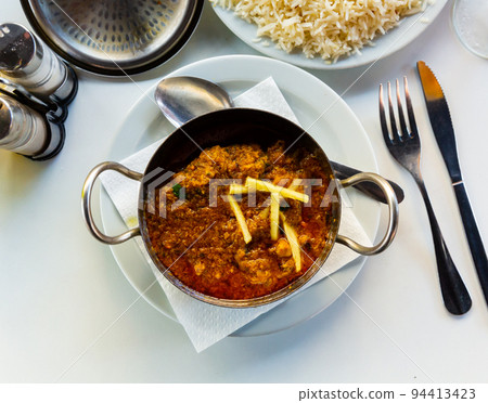 Traditional Indian lamb karahi curry white ginger and rice Traditional Indian lamb karahi curry white ginger and rice 94413423