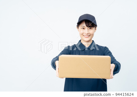 Delivery woman carrying luggage (white back) Delivery woman carrying luggage (white back) 94415624