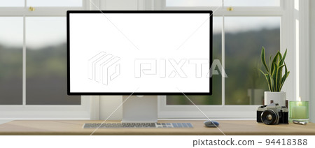 Home or office working space against the window with white pc desktop computer mockup Home or office working space against the window with white pc desktop computer mockup 94418388
