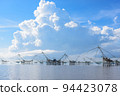 Thailand southern local fishing tool called 'Yor' with one part as a big net located in Thale Noi in Phatthalung province in Thailand with beautiful blue sky and white cloud as background. Cool tone. 94423078