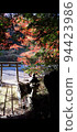 Autumnal leaves and torii 94423986
