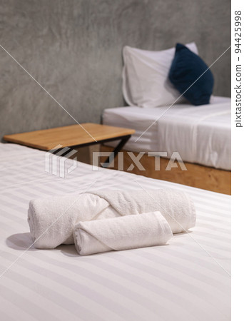 stack of white towel on bedroom stack of white towel on bedroom 94425998