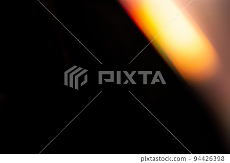 colorful rainbow crystal light leaks on black background 94426398