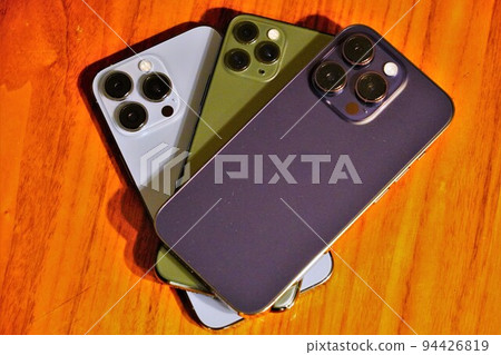 3 smartphones on the desk 3 smartphones on the desk 94426819