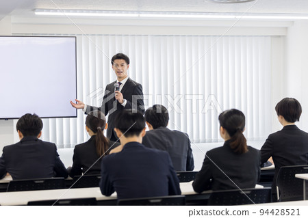 Seminar speaker man speaking with microphone Seminar speaker man speaking with microphone 94428521