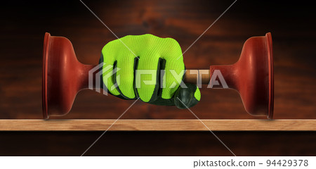 Gloved Hand Holding a Red Rubber Plunger with Wooden Handle Gloved Hand Holding a Red Rubber Plunger with Wooden Handle 94429378