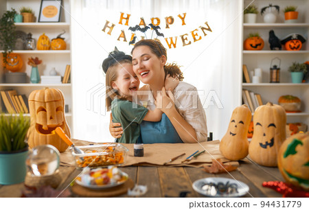 Family preparing for Halloween Family preparing for Halloween 94431779