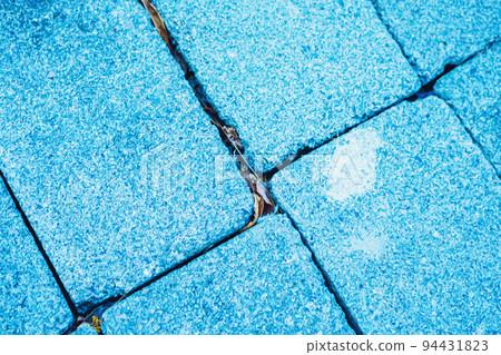 Close-up view rectangular paving stone concrete tile brick. Blue toned photo for design image background web screensaver cover Close-up view rectangular paving stone concrete tile brick. Blue toned photo for design image background web screensaver cover 94431823