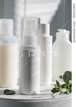 White, plastic beauty products bottle. Blank cosmetics bottle. 94432864