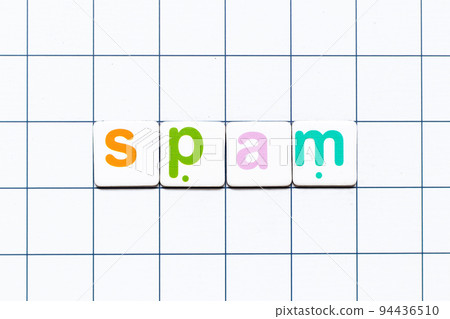 Colorful tile letter in word spam on white grid background Colorful tile letter in word spam on white grid background 94436510
