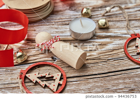Christmas composition withhandmade toys on wooden background, flat lay Christmas composition withhandmade toys on wooden background, flat lay 94436753