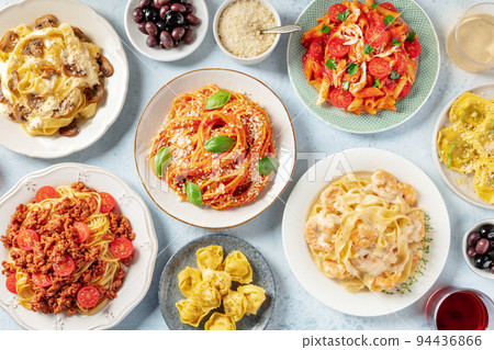 Pasta, many different varieties, overhead flat lay shot. Italian food and drinks Pasta, many different varieties, overhead flat lay shot. Italian food and drinks 94436866