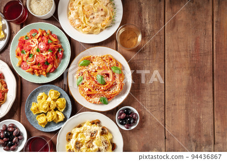 Italian pasta, various dishes, overhead flat lay shot with copy space 94436867